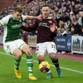 Hibs' Chris Cadden and Hearts' Barrie McKay compete during the last Edinburgh derby league meeting at Tynecastle on January 2. (Photo by Ross Parker / SNS Group)