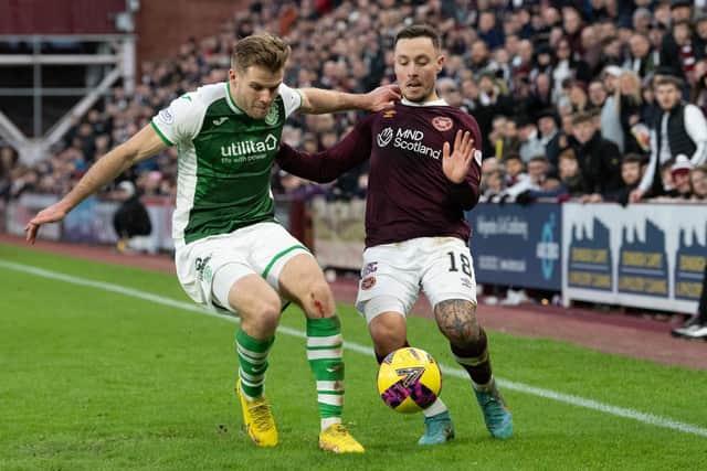 Hibs' Chris Cadden and Hearts' Barrie McKay compete during the last Edinburgh derby league meeting at Tynecastle on January 2. (Photo by Ross Parker / SNS Group)