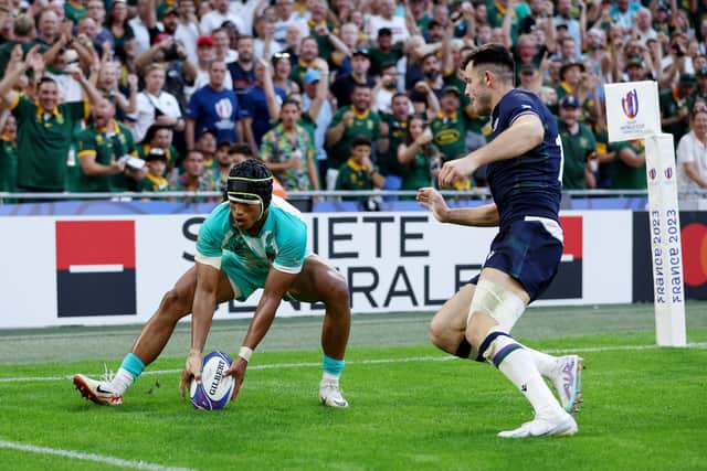 Kurt-Lee Arendse scores South Africa's second try of the match.