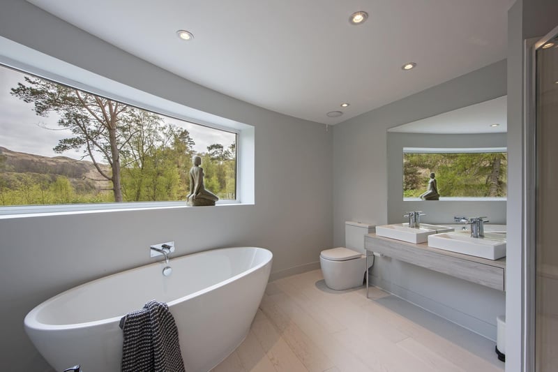 The property features a luxurious bathroom
