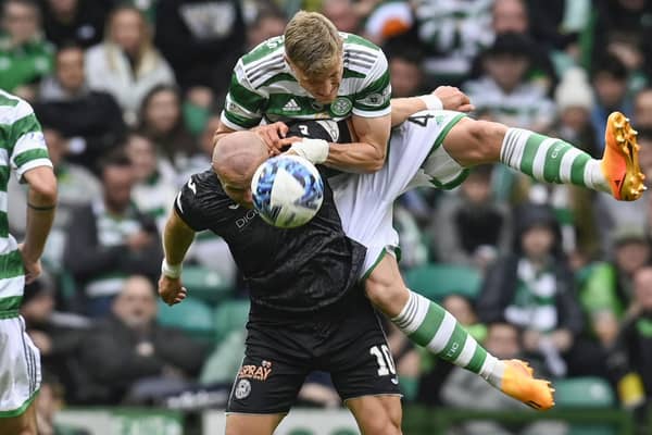 St Mirren's Curtis Main, who netted a double, had the Celtic defence in all sorts of difficulties as demonstrated  in his scrap with Carl Starfelt during the 2-2 draw at Parkhead between the sides. (Photo by Rob Casey / SNS Group)