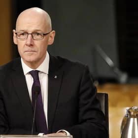 John Swinney will seek clinical advice on face masks