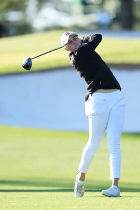 AUGUSTA, GEORGIA - APRIL 02: Hannah Darling of Scotland plays her shot from the third tee during the final round of the Augusta National Women's Amateur at Augusta National Golf Club on April 02, 2022 in Augusta, Georgia. (Photo by David Cannon/Getty Images)