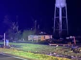 This image obtained from the Mississippi Highway Patrol, Troop D, shows a damaged home near Silver City, Mississippi, after a tornado touched down in the area (Photo by HANDOUT/Mississippi Highway Patrol /AFP via Getty Images)
