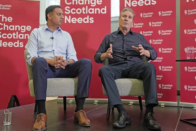 Labour leader Sir Keir Starmer (right) and Scottish Labour leader Anas Sarwar hold an 'In Conversation' event in Glasgow yesterday to discuss what a Labour government would mean for the people of Scotland (Picture: Andrew Milligan/PA Wire)