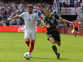 Can Gareth Bale and Wales spring a surprise and defeat England on Tuesday at Qatar 2022? (Photo credit should read DENIS CHARLET/AFP via Getty Images)
