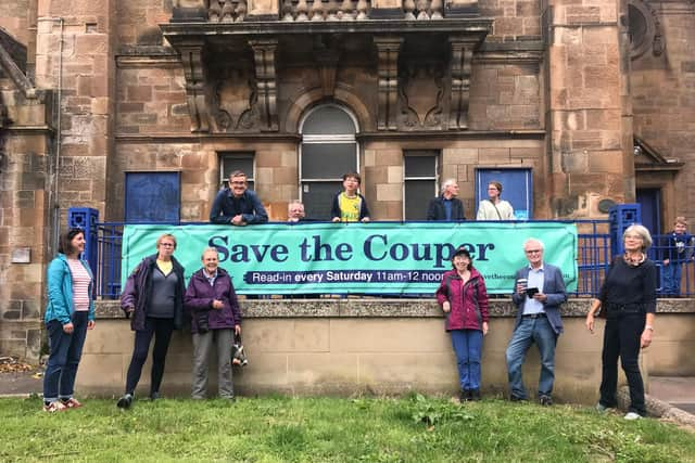 The unveiling of our Save the Couper banner, with some of regular campaigners outside the Cathcart institution.