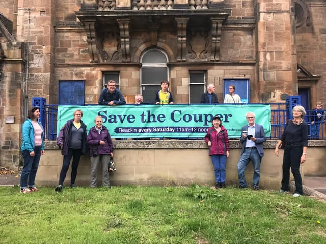 The unveiling of our Save the Couper banner, with some of regular campaigners outside the Cathcart institution.