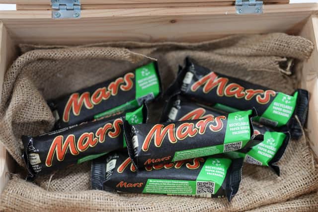 Mars bars have been given a new look as the chocolate bar ditches its traditional plastic wrapper for more environmentally friendly paper packaging. Picture: Mars Wrigley/PA Wire
