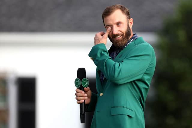 Dustin Johnson wipes away a tear during the Green Jacket ceremony after winning the 2020 Masters at Augusta National Golf Club last November. Picture: Rob Carr/Getty Images.
