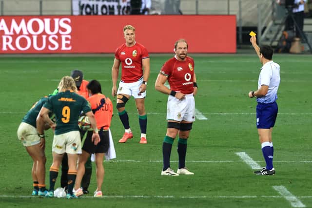 Duhan van der Merwe, in the background, was shown the yellow card by referee Ben O'Keeffe for a trip on Kolbe. Picture: David Rogers/Getty Images