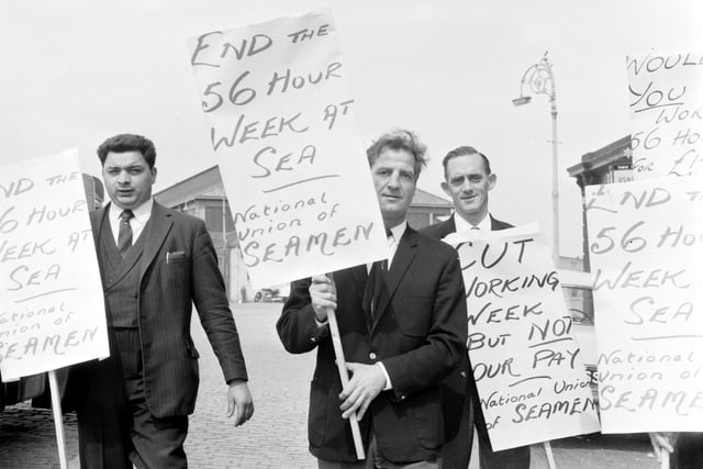 Strikers on picket duty outside Leith Docks, Edinburgh, during the seamen's strike in May 1966.