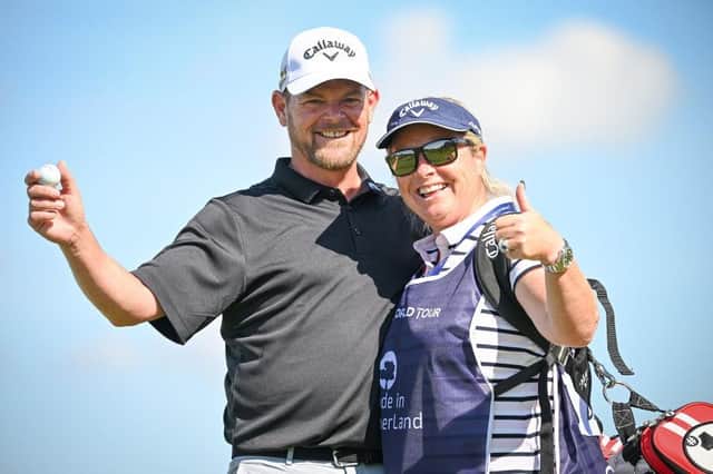 David Drysdale celebrates his hole in one with his caddie and wife Vicky during day two of the Made in HimmerLand at Himmerland Golf & Spa Resort. Picture: Stuart Franklin/Getty Images.