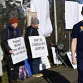 Dr Greg Irwin, in front of the vigil.