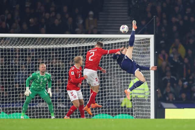 ​Scott McTominay scores with the spectacular overhead kick against Denmark which helped Scotland on the way to the 4-2 victory that secured qualification to the World Cup (Picture: Stu Forster/Getty)