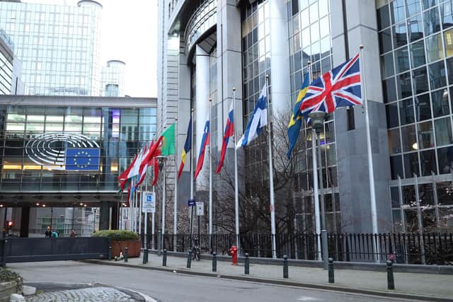 The UK flag flies outside the European Parliament in Brussels on January 31, 2020, the day Britain formally left the EU (Picture: Yui Mok/PA Wire)