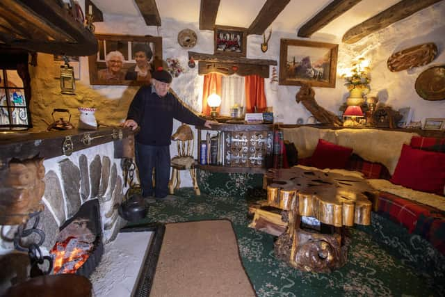 Ninety-year-old retired woodcutter Stuart Grant in his cottage.