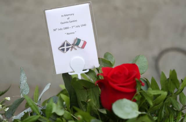 Flowers are laid the memorial stone in the Italian garden at St Andrew's Cathedral, Glasgow following a mass to mark the 80th anniversary of the death of around 100 Scots-Italians in the World War Two sinking of the Arandora Star. PIC: Andrew Milligan/PA Wire.