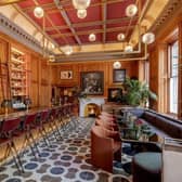 Original features make for a grand bar space on the lobby level floor. Pic: Contributed