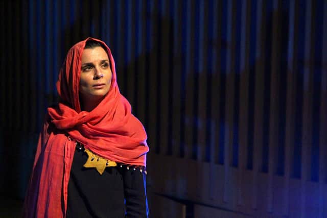 Suzanne Ahmet as Blanca the Jewish woman. Photo by Robert Piwko