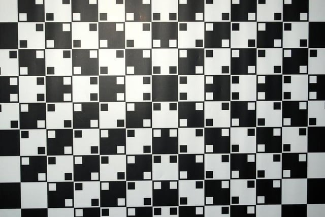 Do the lines appear curved or straight to you in this checkerboard illusion?