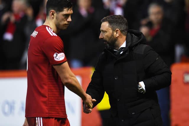 The strength of the pair's relationship means that, even now,  Scott McKenna would have no hesitation getting in touch with Derek McInnes if he "needed anything". (Photo by Craig Williamson/SNS Group).