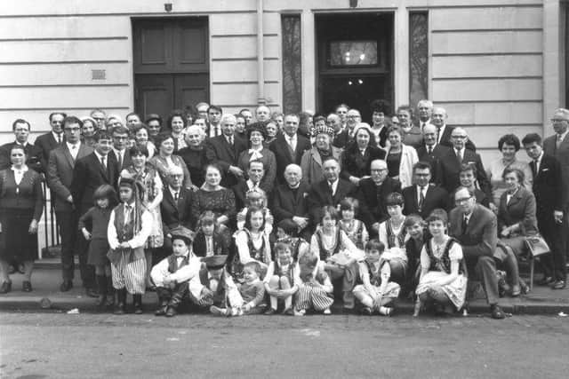 Photograph of The Sikorski Polish Club in 1954 in front of their building at Park Grove Terrace in Glasgow. Some of the ex Polish Soldiers and their families who founded the Society are photographed (Photo: The Sikorski Polish Club).
