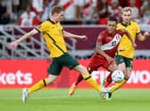 Hearts duo Kyle Rowles and Nathaniel Atkinson have been named in Australia's World Cup squad.