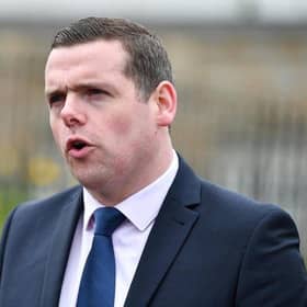 The SNP has written to Douglas Ross urging him to choose between being an MP and MSP