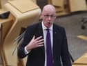 John Swinney's talk of collaborating with other political parties is at odds with his combative track record in the Scottish Parliament (Picture: Fraser Bremner/pool/Daily Mail/PA)