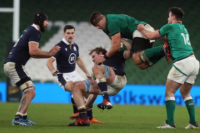 Ireland flanker CJ Stander gets the jump on Scotland lock Jonny Gray during the Autumn Nations Cup third-place play-off at the Aviva Stadium.