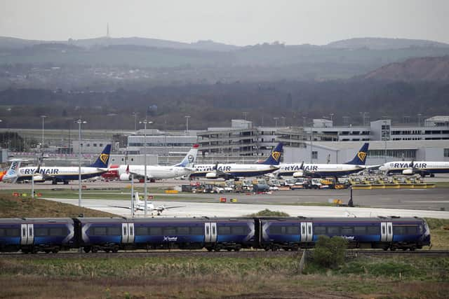 The Scottish Greens said a frequent flyer tax could fund rail improvements to encourage passengers to switch to trains. Picture: PA