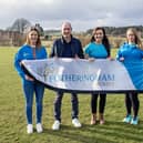 Michael Fotheringham, Director of Fotheringham Homes, with (L-R) Vicki Findlater, Hannah McGregor and Debbie Wilkinson from St Cyrus Solos Running Club.