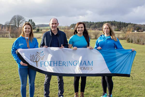 Michael Fotheringham, Director of Fotheringham Homes, with (L-R) Vicki Findlater, Hannah McGregor and Debbie Wilkinson from St Cyrus Solos Running Club.
