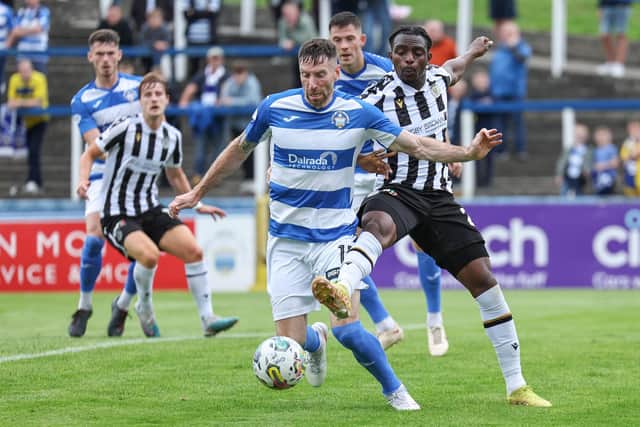 Morton's Kirk Broadfoot and St Mirren's Toyosi Olusanya during the pre-season friendly match at Cappielow.  (Photo by Ross MacDonald / SNS Group)