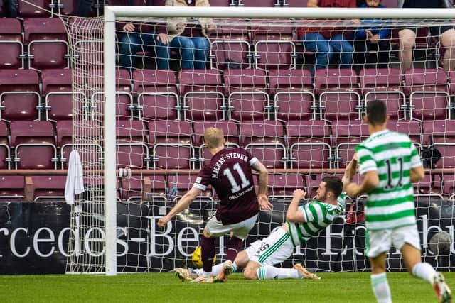 Gary Mackay-Steven scores Hearts' first against Celtic.