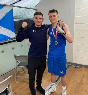 With son Drew, a promising boxer
