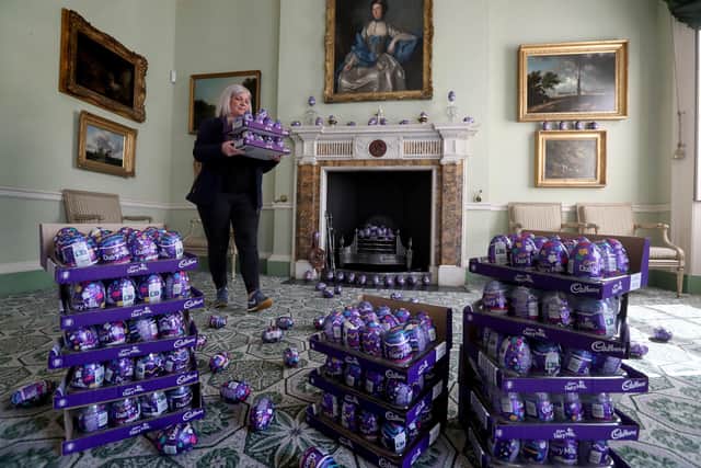 Claire Grant from the National Trust for Scotland with a pile of Easter eggs.