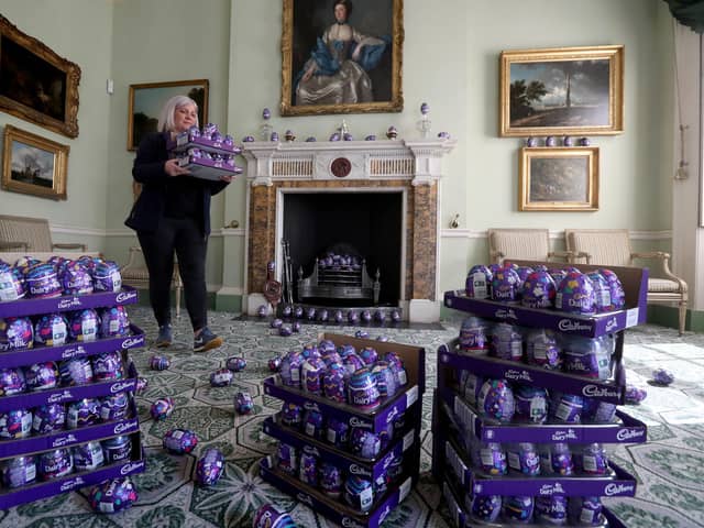 Claire Grant from the National Trust for Scotland with a pile of Easter eggs.