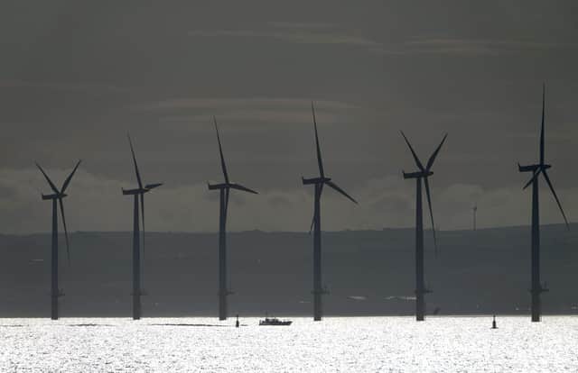 The auctioning of rights to create wind farms in the seas off the coast of Scotland raised £700 million