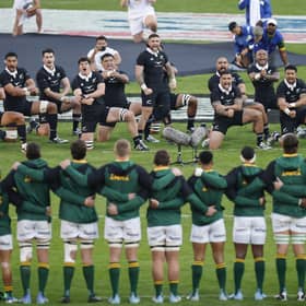New Zealand players perform the Haka ahead of the Rugby Championship Test match against South Africa at Ellis Park Stadium in Johannesburg.  (Photo by PHILL MAGAKOE/AFP via Getty Images)