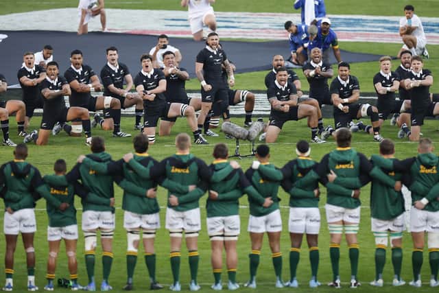 New Zealand players perform the Haka ahead of the Rugby Championship Test match against South Africa at Ellis Park Stadium in Johannesburg.  (Photo by PHILL MAGAKOE/AFP via Getty Images)