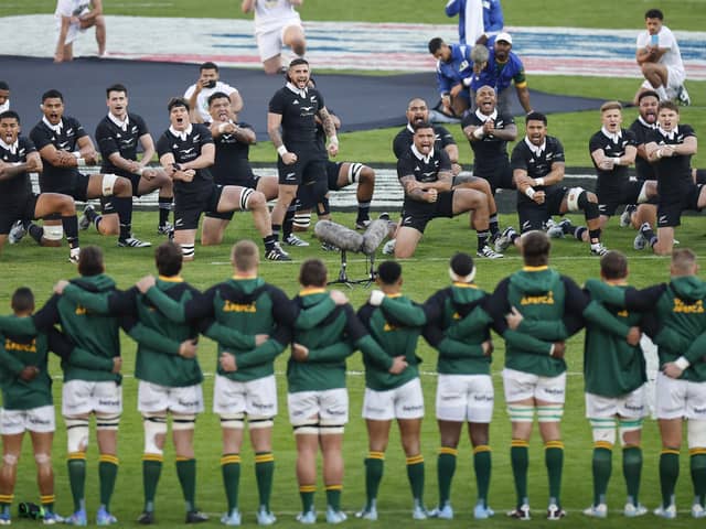 New Zealand players perform the Haka ahead of the Rugby Championship Test match against South Africa at Ellis Park Stadium in Johannesburg.  (Photo by PHILL MAGAKOE/AFP via Getty Images)