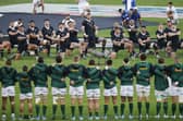 New Zealand players perform the Haka ahead of the Rugby Championship Test match against South Africa at Ellis Park Stadium in Johannesburg.  (Photo by PHILL MAGAKOE/AFP via Getty Images)