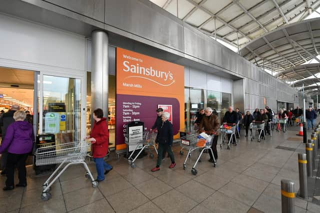 Shoppers queue outside a branch of Sainsbury's during the first lockdown in March 2020. Picture: Dan Mullan/Getty Images