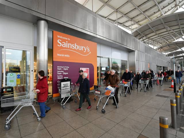 Shoppers queue outside a branch of Sainsbury's during the first lockdown in March 2020. Picture: Dan Mullan/Getty Images