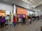 Shoppers queue outside a branch of Sainsbury's during the first lockdown in March 2020. Picture: Dan Mullan/Getty Images