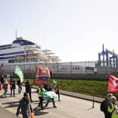 Protesters leave the P&O site at the Port of Hull, East Yorkshire, after P&O Ferries suspended sailings and handed 800 seafarers immediate severance notices. Picture date: Friday March 18, 2022.