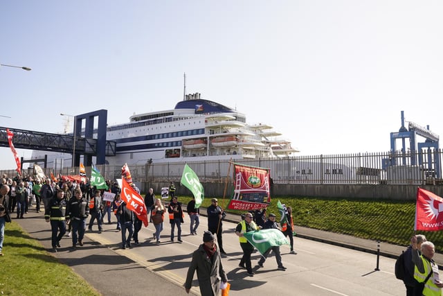 Protesters leave the P&O site at the Port of Hull, East Yorkshire, after P&O Ferries suspended sailings and handed 800 seafarers immediate severance notices. Picture date: Friday March 18, 2022.