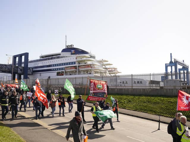 Protesters leave the P&O site at the Port of Hull, East Yorkshire, after P&O Ferries suspended sailings and handed 800 seafarers immediate severance notices. Picture date: Friday March 18, 2022.